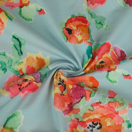 Tissu coton Annie bleu ciel à motif fleurs peintes rose, orange et vert