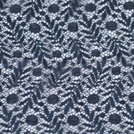 Tissu dentelle bleu à motif feuillage