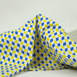 Tissu popeline de coton blanc à motif losange bleu et jaune