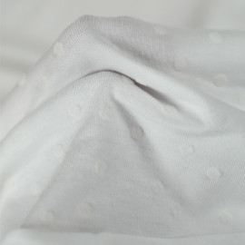 Tissu jersey de coton blanc à motif petit pois velours écru