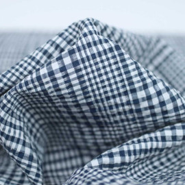 Tissu poly-coton seersucker bleu à motif carreaux blanc